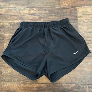 Women’s Nike dri-fit black shorts. Size Medium.